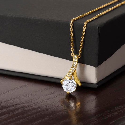 Alluring Beauty Necklace – Mother's Day gift necklace in gold finish with ribbon pendant