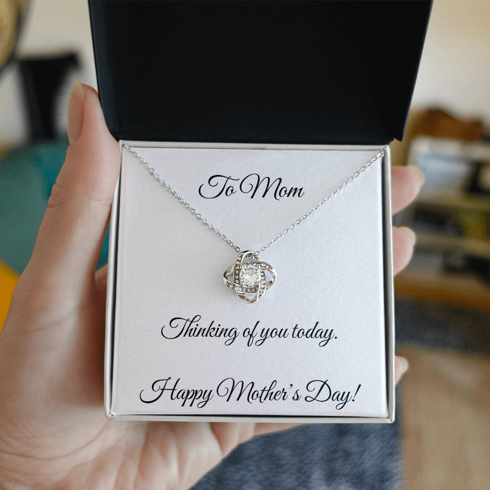 Mother's Day Love Knot Necklace with cubic zirconia pendant in 14k white gold