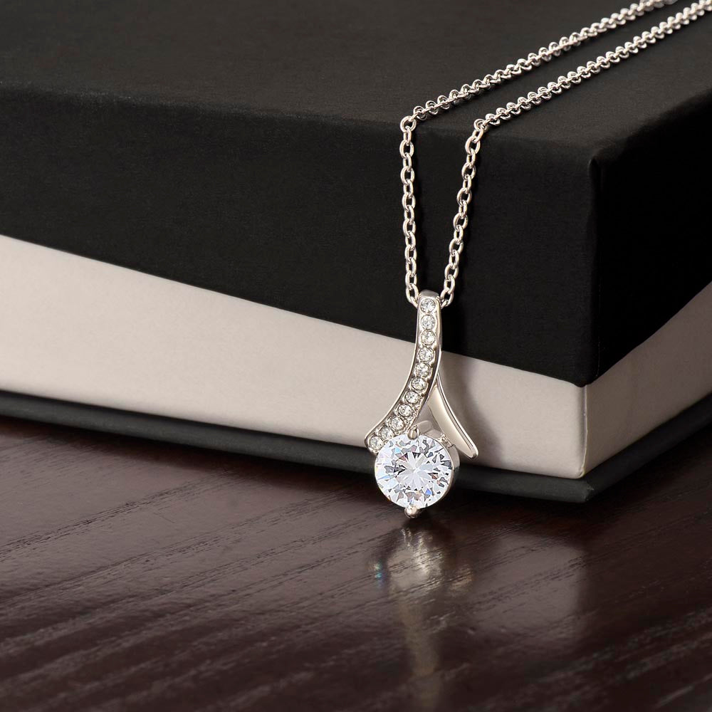 Alluring Beauty Necklace close-up of cubic zirconia ribbon pendant in white gold finish