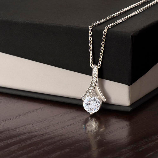 Alluring Beauty Necklace close-up of cubic zirconia ribbon pendant in white gold finish